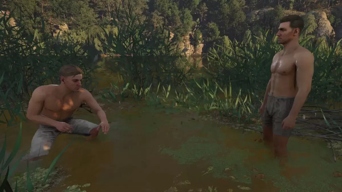 Hans y Henry en el reino vienen: liberación 2, con Henry agachado en las cañas, y Henry de pie, ambos en sus pantalones.